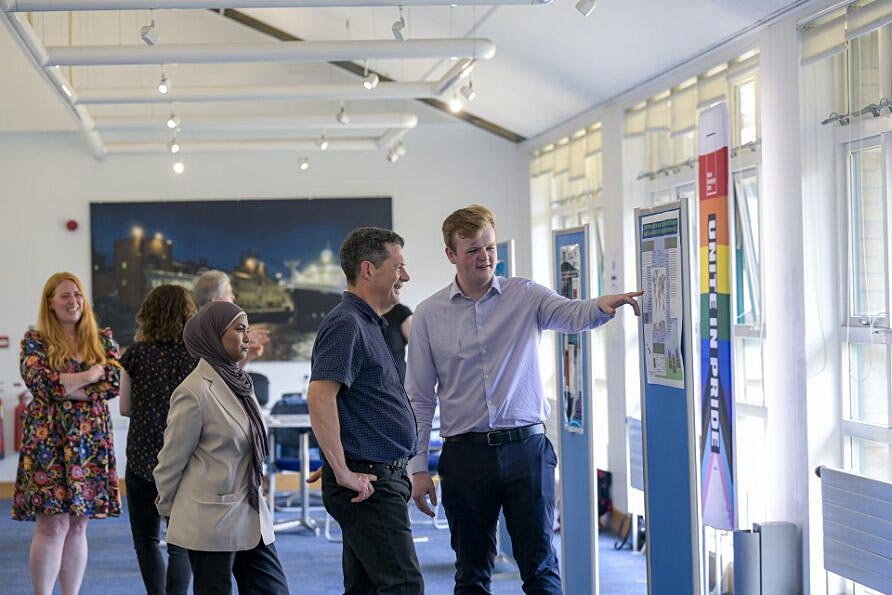 Itrat and Dylan presenting